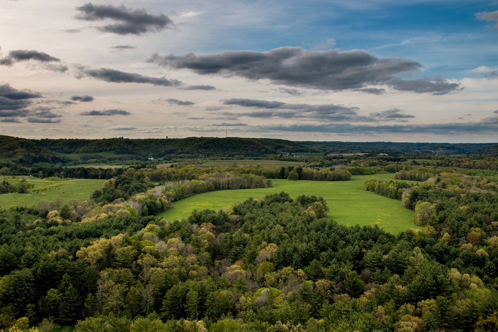An aerial view of the green field and trees around Wildcat Mountain, Wisconsin.