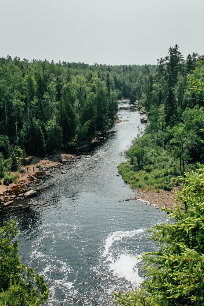 A view of a river surrounded by trees in Duluth, MN.