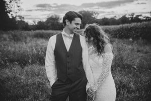 Black and white photo of a bride and groom captured by a Rochester MN Wedding Photographer.