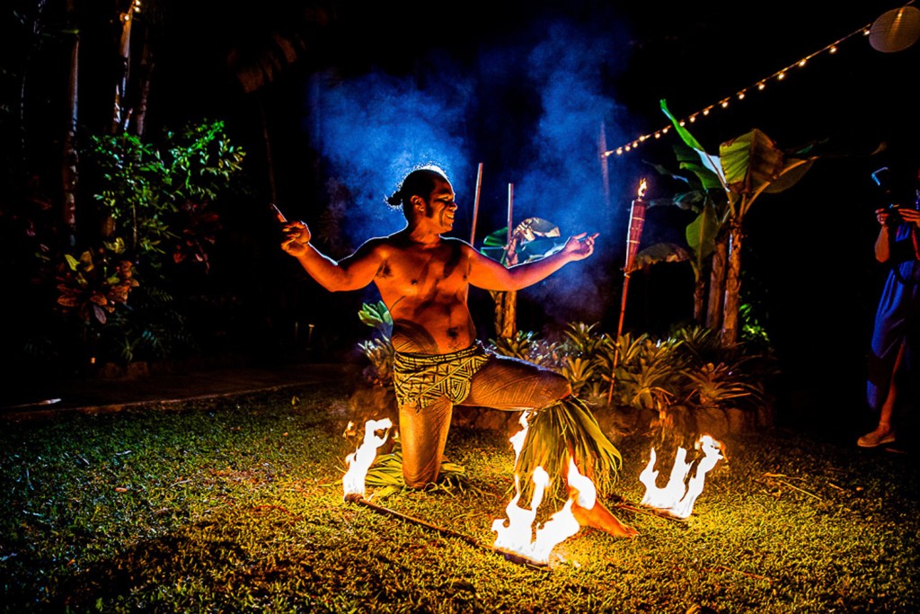 A dazzling fire dancer performing at an Oahu wedding.