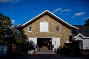 Mayowood Stone Barn with a door in front of it.