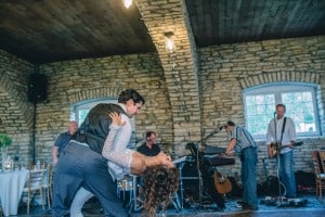 A bride and groom dancing at their wedding reception at Mayowood Stone Barn.