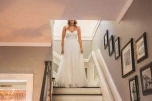 A bride in her wedding dress captured by the Littleton Wedding Photographer.