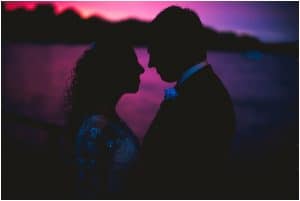A silhouette of a bride and groom at the La Crosse Center.