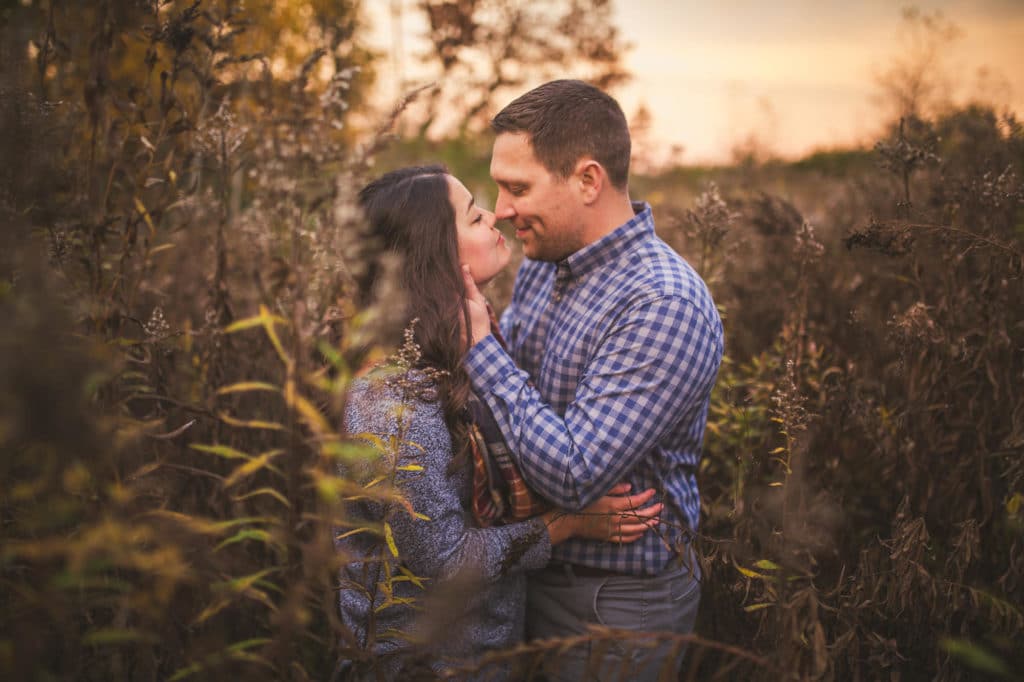 A couple kisses during their Millers Bluff engagement session.