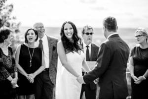 A black and white photo of a wedding ceremony.