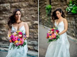 A bride in a white dress holding a colorful bouquet.