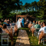An emotional backyard wedding ceremony in La Crosse, featuring a bride and groom.