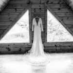 A love-filled wedding dress photo from Courtney and James' Trempleau backyard.