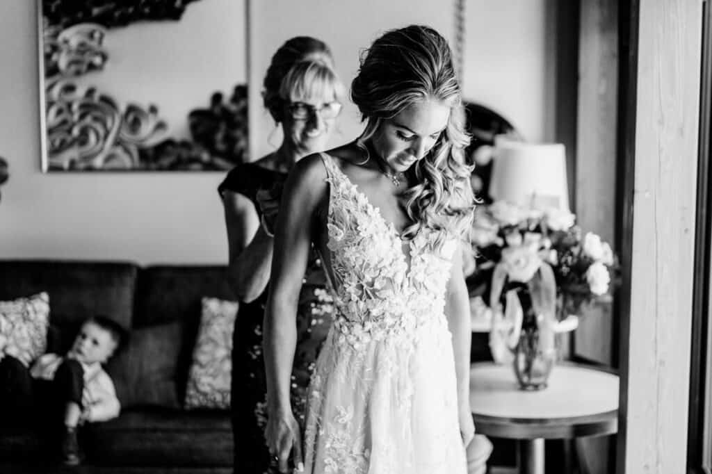 A bride getting ready in a hotel room.