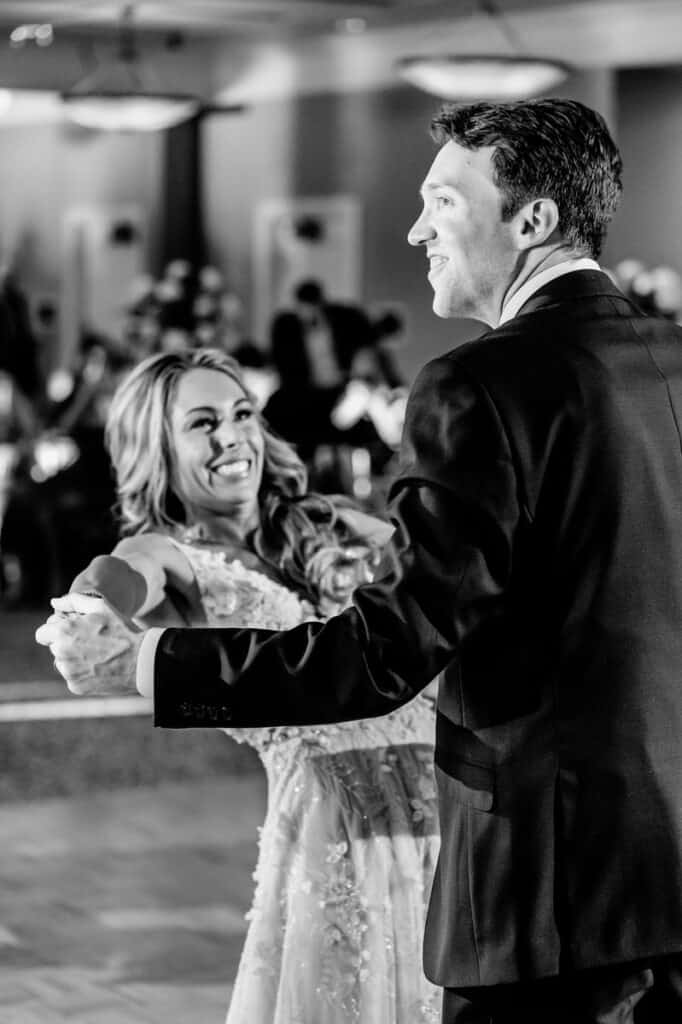 A bride and groom sharing their first dance.