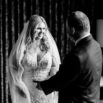 A black and white photo of a bride and groom.
